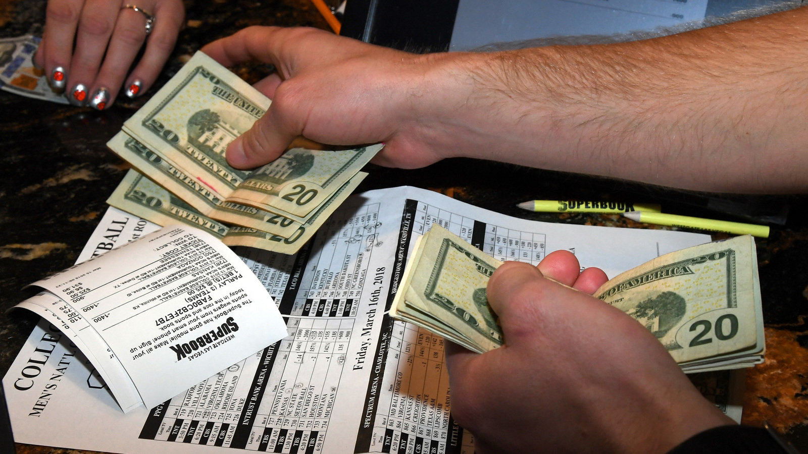 Photo: do people make money sports betting