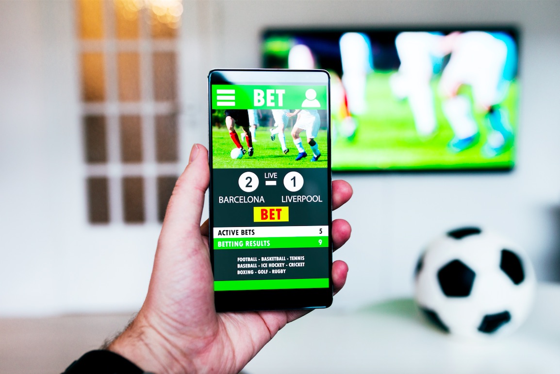 Photo: how old to bet on sports online